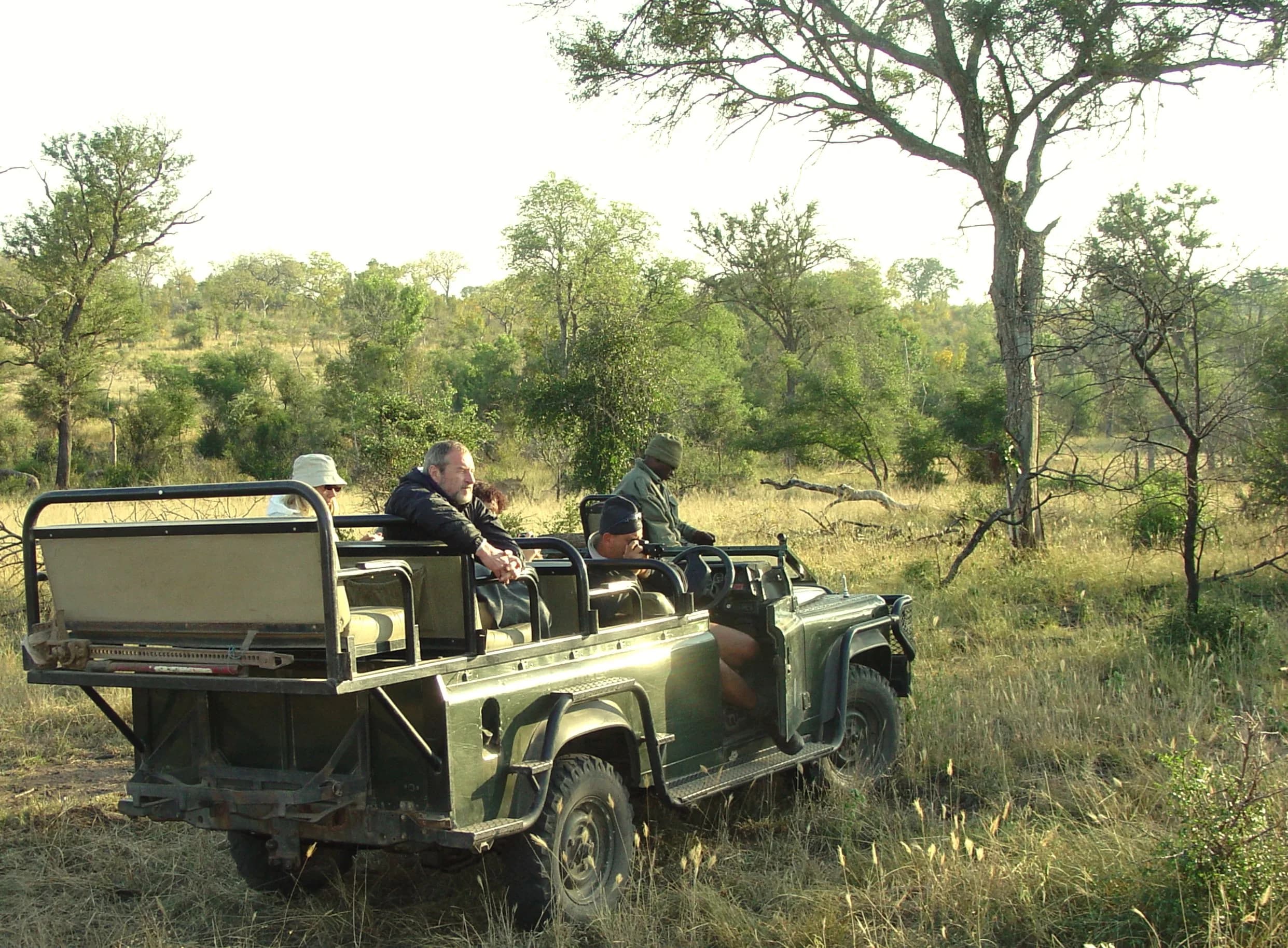 A game drive vehicle on an open plain