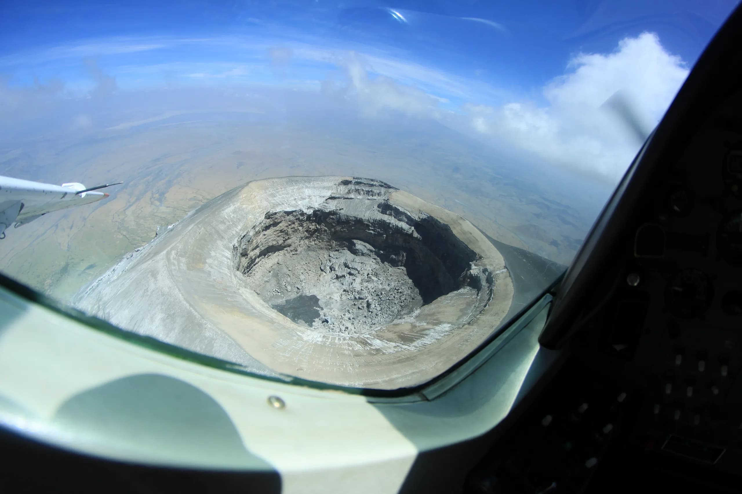 A crater lake ringed by farmland